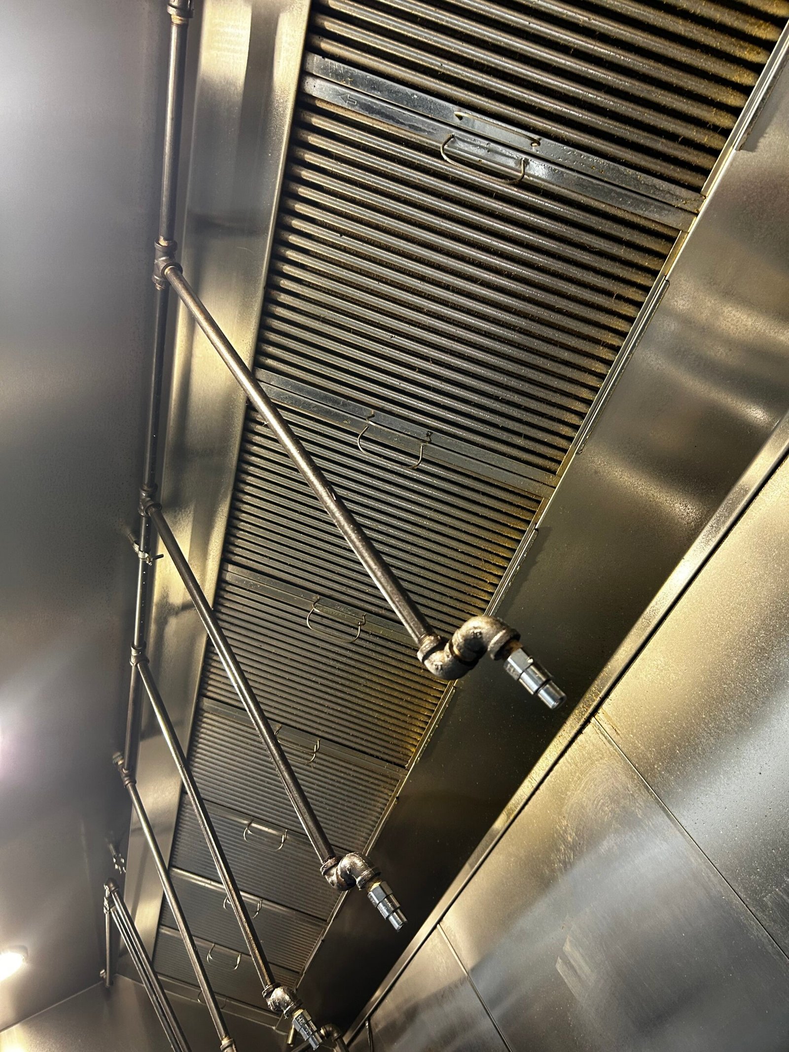Greasy extractor hood before cleaning